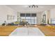 View from the kitchen sink to the hardwood floored living room with lots of light at 620 Peachtree Ne St # 403, Atlanta, GA 30308