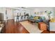 Bright living room with modern furnishings, hardwood floors, and an open layout to the kitchen at 620 Peachtree Ne St # 403, Atlanta, GA 30308