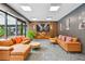 Stylish lounge area with comfortable seating and large-screen TV, perfect for relaxation at 620 Peachtree Ne St # 403, Atlanta, GA 30308