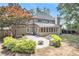 This home features a beautiful backyard with a large patio, fire pit and mature landscaping at 1198 Larson Sw Ln, Marietta, GA 30064