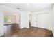 This bedroom boasts hardwood floors, closet, and an open doorway leading to another room at 1198 Larson Sw Ln, Marietta, GA 30064
