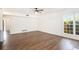 Expansive living room with hardwood floors, ample natural light, and access to other rooms at 1198 Larson Sw Ln, Marietta, GA 30064