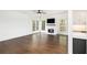 Spacious living room boasts hardwood floors, a marble fireplace and three large picture windows at 1198 Larson Sw Ln, Marietta, GA 30064