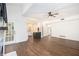 Hardwood floors, fireplace and open layout into the kitchen highlight the spacious living room at 1198 Larson Sw Ln, Marietta, GA 30064