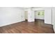 Spacious bedroom with hardwood floors, multiple doors, and plenty of room for furnishings at 1198 Larson Sw Ln, Marietta, GA 30064