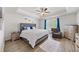 Spacious main bedroom features a tray ceiling and ample natural light, creating a peaceful retreat at 20 Tarpley Way, Covington, GA 30016