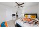 Bright bedroom with a ceiling fan, neutral colors, and plenty of natural light at 20 Tarpley Way, Covington, GA 30016