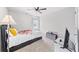 Comfortable bedroom with natural light, neutral carpet, and a cozy atmosphere at 20 Tarpley Way, Covington, GA 30016