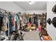 Spacious walk-in closet with ample shelving and storage space for clothes and accessories at 20 Tarpley Way, Covington, GA 30016