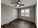 This bedroom features hardwood floors, natural lighting, and neutral-painted walls at 2550 Stoney Brook Ne Ln, Marietta, GA 30062