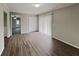 Open living area with new flooring and sliding glass doors for ample natural light at 2550 Stoney Brook Ne Ln, Marietta, GA 30062