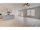 Open-concept living area featuring stylish laminate flooring and ample natural light at 305 Heavenly Hollow Pl, Mcdonough, GA 30253