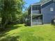 Expansive backyard featuring a deck and screened porch, perfect for outdoor living at 4790 Brandon Acres Ln, Buford, GA 30519