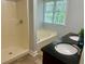 Bathroom featuring double sinks with granite countertop, tub and shower combination at 4790 Brandon Acres Ln, Buford, GA 30519