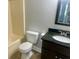 Cozy bathroom featuring a modern vanity with a dark cabinet and sleek fixtures, plus a tub-shower combo at 4790 Brandon Acres Ln, Buford, GA 30519