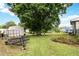 Vast backyard with mature trees, offering ample space and a sense of privacy at 5791 Cobbrook Dr, Ellenwood, GA 30294