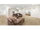 Basement living area with cozy furniture and an archway leading to a recreation room at 1265 Timberline Pl, Alpharetta, GA 30005