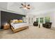 Spacious main bedroom featuring a tray ceiling, sitting area, and natural light at 1265 Timberline Pl, Alpharetta, GA 30005