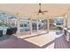 Covered outdoor pavilion with ceiling fan overlooking a community pool; ideal for relaxation at 1265 Timberline Pl, Alpharetta, GA 30005