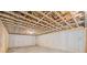 Spacious unfinished basement area with concrete walls, open ceiling, and concrete floor at 2585 Hickory Rd, Canton, GA 30115