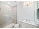 Bathroom with walk-in shower, toilet, white vanity, and white marble countertop at 2585 Hickory Rd, Canton, GA 30115