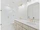 Bathroom with double vanity, large mirrors, and glass shower at 2585 Hickory Rd, Canton, GA 30115