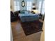 Bright bedroom with hardwood floors and shuttered windows, creating a cozy ambiance at 3655 Peachtree Rd # 203, Atlanta, GA 30319