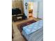 Cozy bedroom featuring light hardwood floors and a spacious layout at 3655 Peachtree Rd # 203, Atlanta, GA 30319