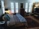 Comfortable bedroom with multiple windows, natural light, and elegant decor at 3655 Peachtree Rd # 203, Atlanta, GA 30319