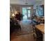 Cozy living room with natural light, featuring hardwood floors and a comfortable seating area at 3655 Peachtree Rd # 203, Atlanta, GA 30319