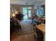 Bright and airy living area with hardwood floors, large windows, and stylish decor at 3655 Peachtree Rd # 203, Atlanta, GA 30319