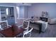 Spacious seating area with stylish decor, wet bar, and an abundance of natural light at 3655 Peachtree Rd # 203, Atlanta, GA 30319