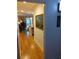 Open concept living room and kitchen area with hardwood floors and modern fixtures at 3655 Peachtree Rd # 203, Atlanta, GA 30319