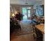 Comfortable living room with natural light streaming in from a private balcony, perfect for relaxing at 3655 Peachtree Rd # 203, Atlanta, GA 30319