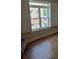 Window with white shutters overlooking the brick building and street at 3655 Peachtree Rd # 203, Atlanta, GA 30319