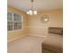 Cozy bedroom featuring soft lighting, neutral-toned walls, and a comfortable seating area at 4150 Soaring Dr, Douglasville, GA 30135