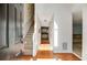 Inviting foyer with hardwood floors, a staircase, and ample natural light streaming through the doorway at 4150 Soaring Dr, Douglasville, GA 30135