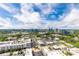 Panoramic aerial view showcasing the property's lush surroundings and city skyline at 4561 Olde Perimeter Way # 2102, Atlanta, GA 30346