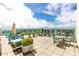 Spacious balcony with seating, greenery and panoramic city views at 4561 Olde Perimeter Way # 2102, Atlanta, GA 30346