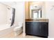 Bathroom with granite counters, tiled floor and shower-tub combination at 4561 Olde Perimeter Way # 2102, Atlanta, GA 30346