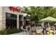 Exterior of restaurant with outdoor seating and vibrant surroundings at 4561 Olde Perimeter Way # 2102, Atlanta, GA 30346