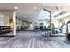 Well-equipped gym with modern exercise machines and mirrored walls, offering a complete fitness experience at 4561 Olde Perimeter Way # 2102, Atlanta, GA 30346