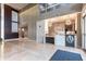 Grand lobby featuring high ceilings, marble floors, and a modern reception area with stylish lighting at 4561 Olde Perimeter Way # 2102, Atlanta, GA 30346