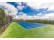 Well-maintained tennis court with a green and blue surface, perfect for sports and recreation at 4561 Olde Perimeter Way # 2102, Atlanta, GA 30346