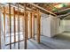 Spacious unfinished basement featuring stud framing, white walls, and sealed concrete floor at 130 Opal Ln, Carrollton, GA 30116