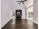 Spacious living room features high ceilings, hardwood floors, and fireplace at 130 Opal Ln, Carrollton, GA 30116