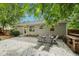 Lovely backyard featuring an outdoor kitchen, patio, and a yellow back door at 1605 Wellswood Se Dr, Atlanta, GA 30315