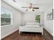 Bright bedroom with hardwood floors, white trim, and large windows, providing ample natural light at 1605 Wellswood Se Dr, Atlanta, GA 30315