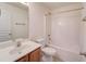 Clean bathroom with a tub/shower combination, a vanity, and a toilet at 1761 Stoney Chase Dr, Lawrenceville, GA 30044