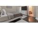 The bedroom features modern decor, hardwood floors, and lots of natural light at 1761 Stoney Chase Dr, Lawrenceville, GA 30044